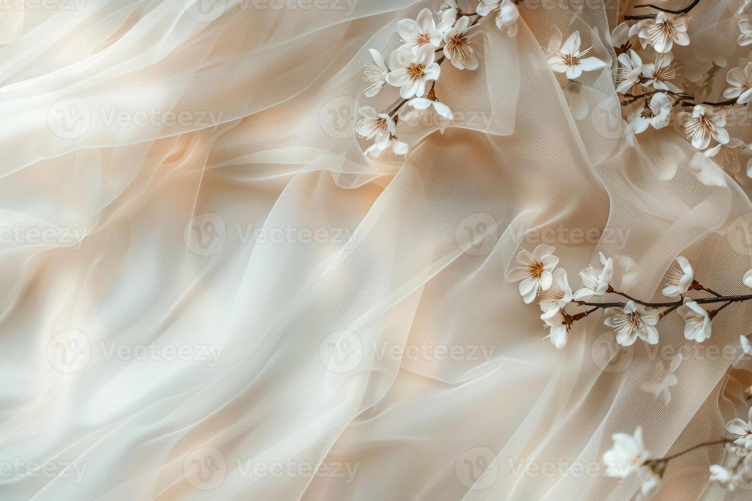 A soft and ethereal fabric, complemented by delicate blossoms, produces a serene and beautifully enchanting aesthetic photo