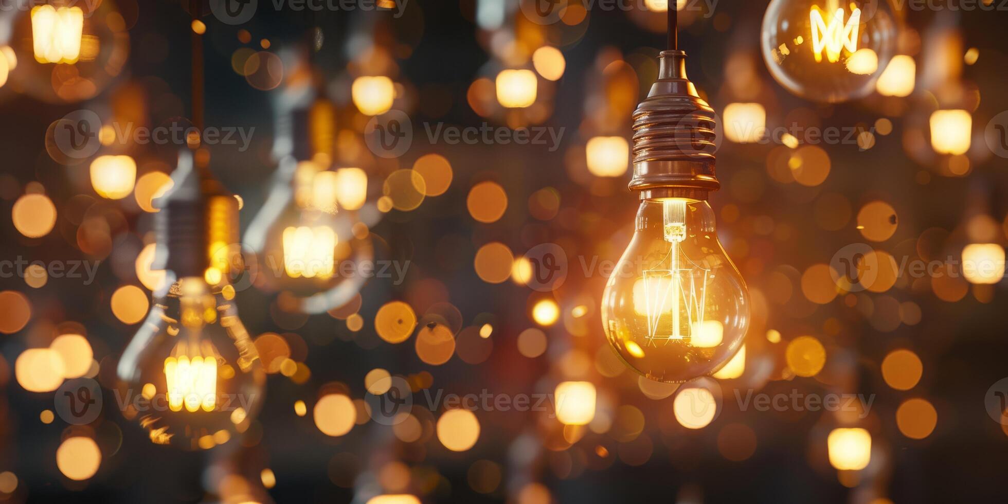 A captivating and visually stunning display of numerous glowing light bulbs that create a warm and inviting ambiance photo