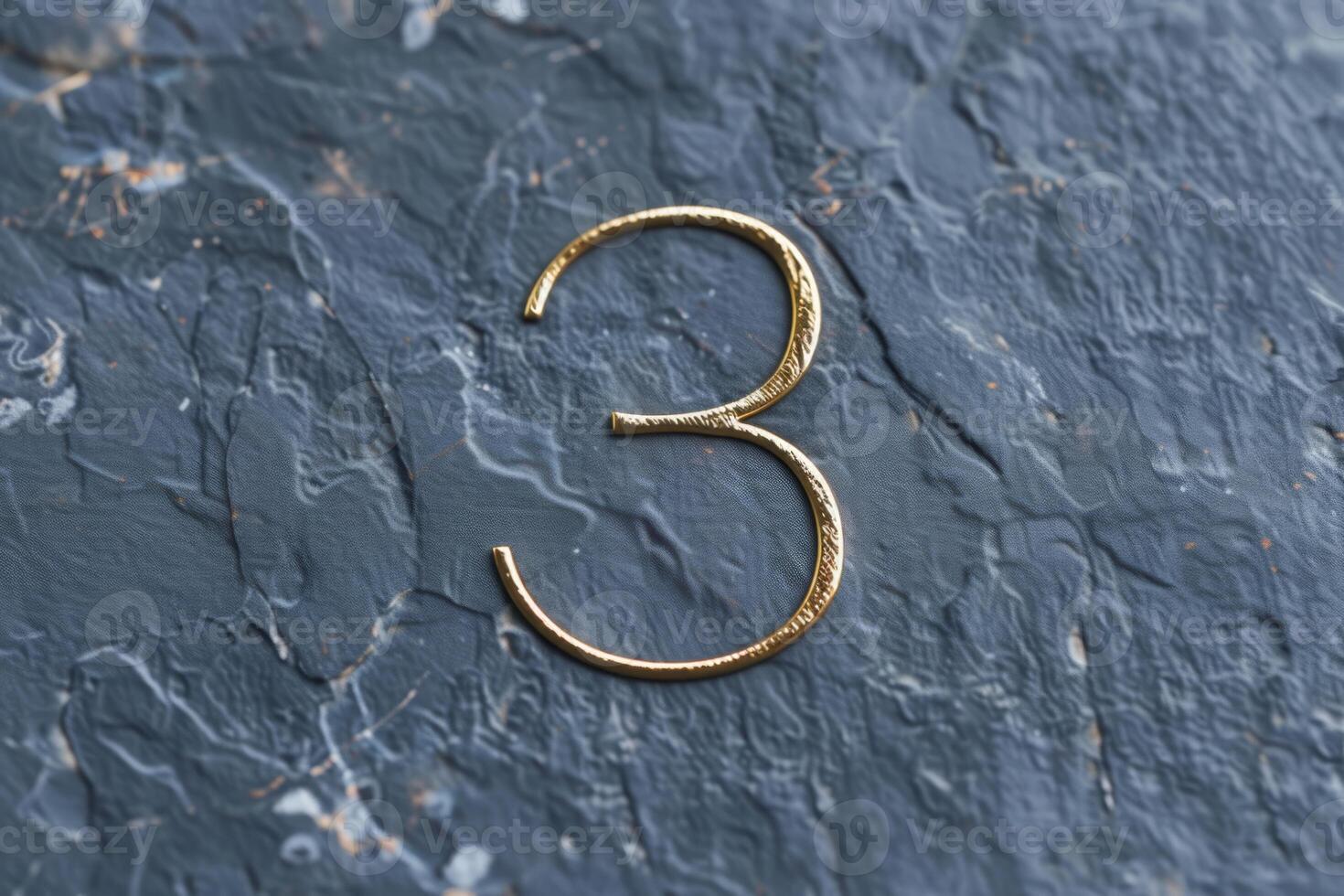 An elegant golden numeral three beautifully showcased against a sleek and sophisticated dark background photo