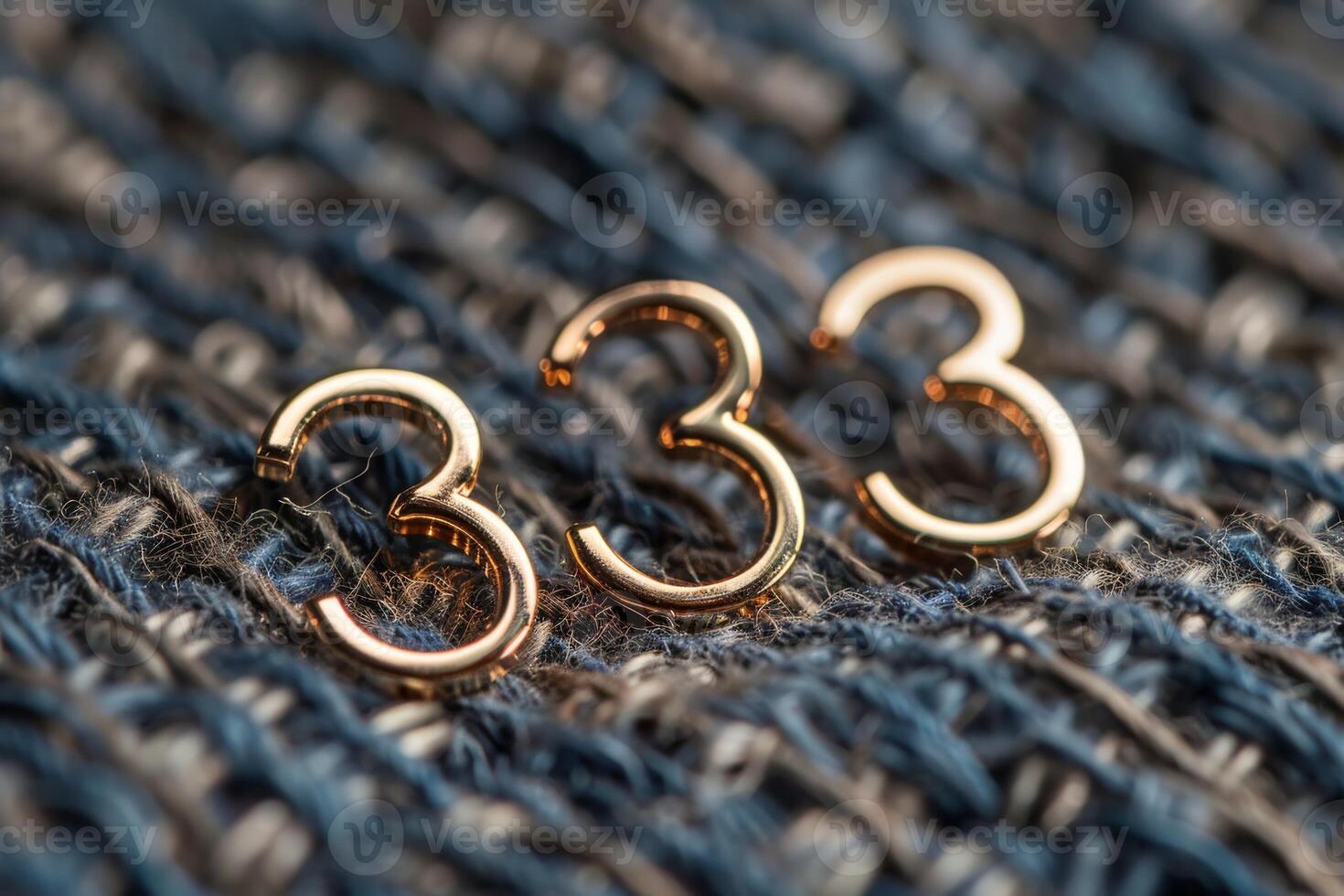 Chic gold 33 embellishments beautifully showcased on textured fabric, ideal for fashion and design inspiration photo