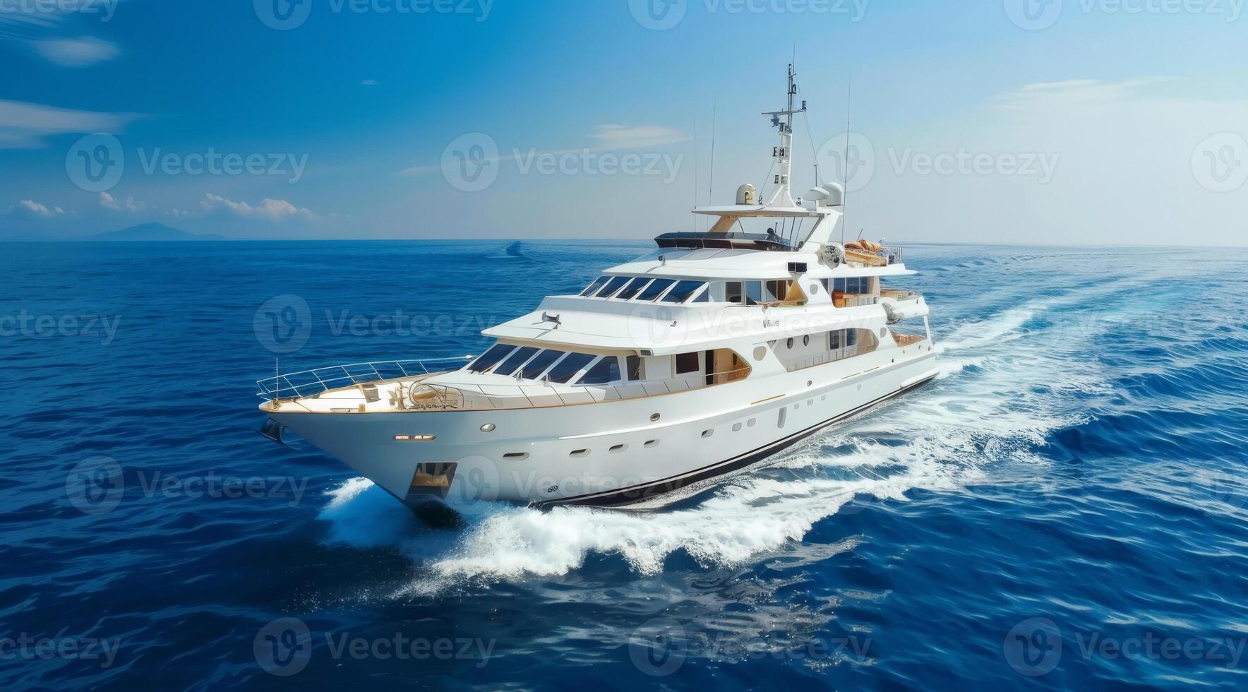 A breathtakingly stunning luxury yacht gracefully cruising through the vibrant blue ocean waters of paradise photo