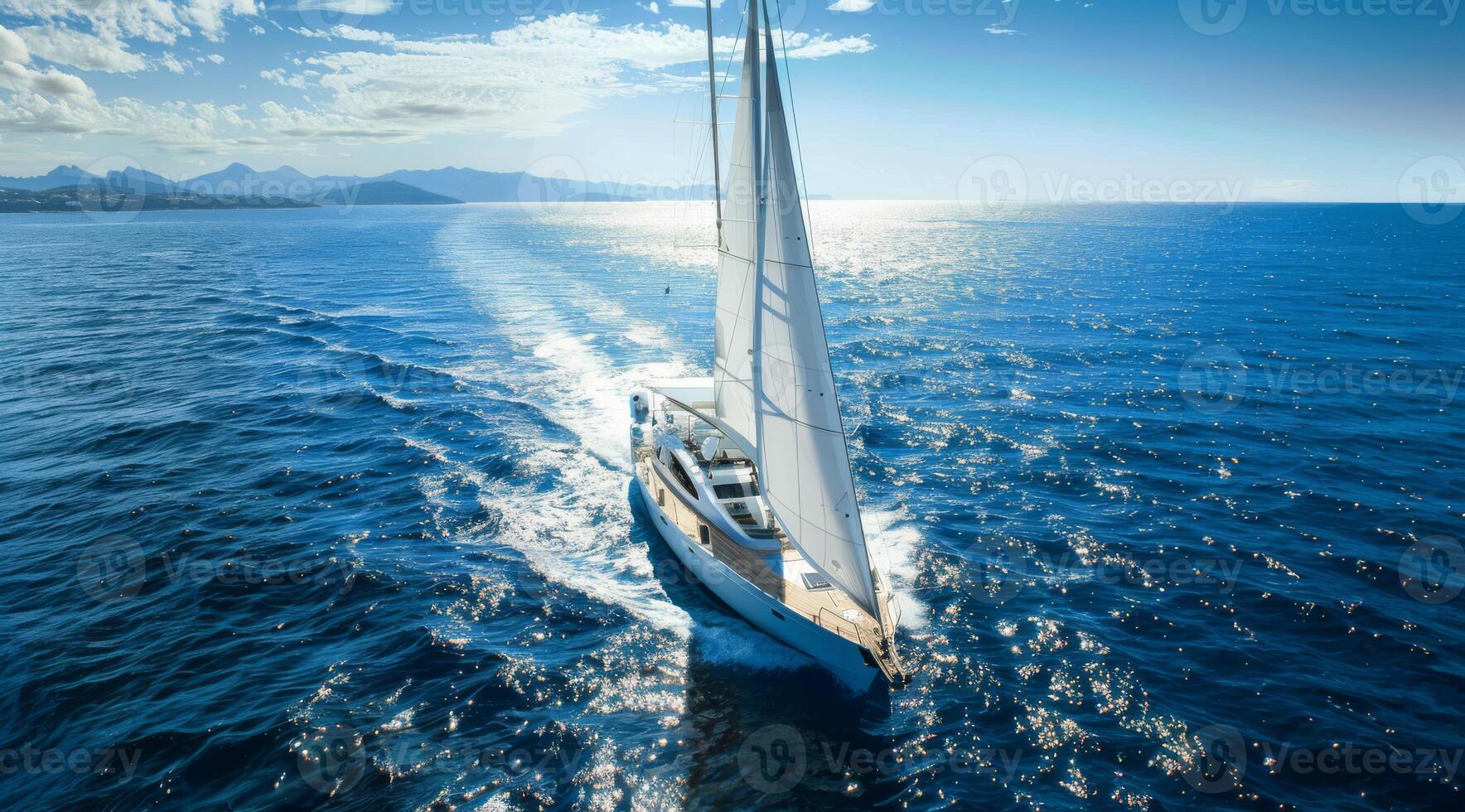 A serene sailing vessel gliding across the shimmering sea, capturing the essence of adventure and exploration photo
