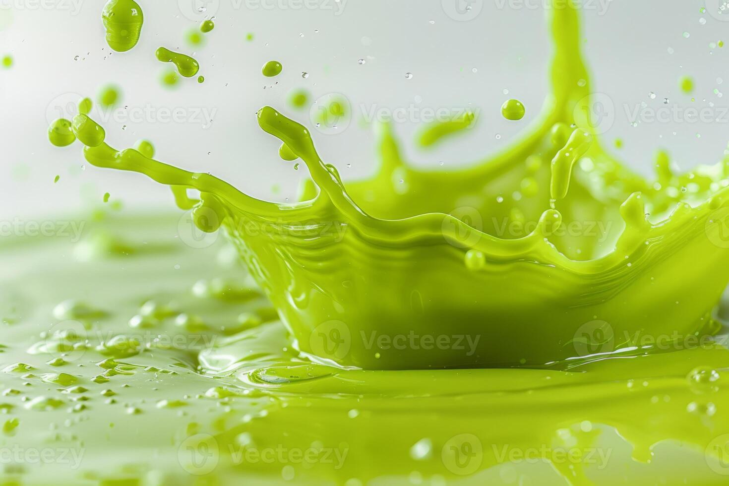 A beautiful and vibrant splash of green smoothie that perfectly showcases freshness and vitality, highlighting the importance of healthy living and delicious, nutritious options for a balanced diet photo