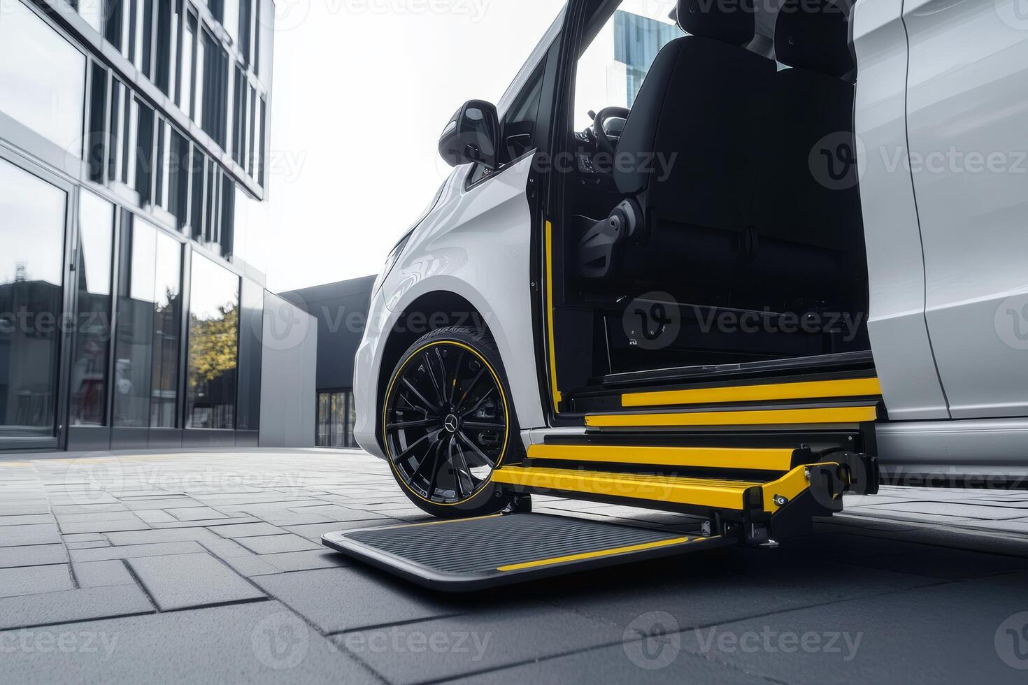 This modern minivan is equipped with a specially designed wheelchair accessible ramp, which enhances ease of access and mobility for individuals who require assistance while traveling photo