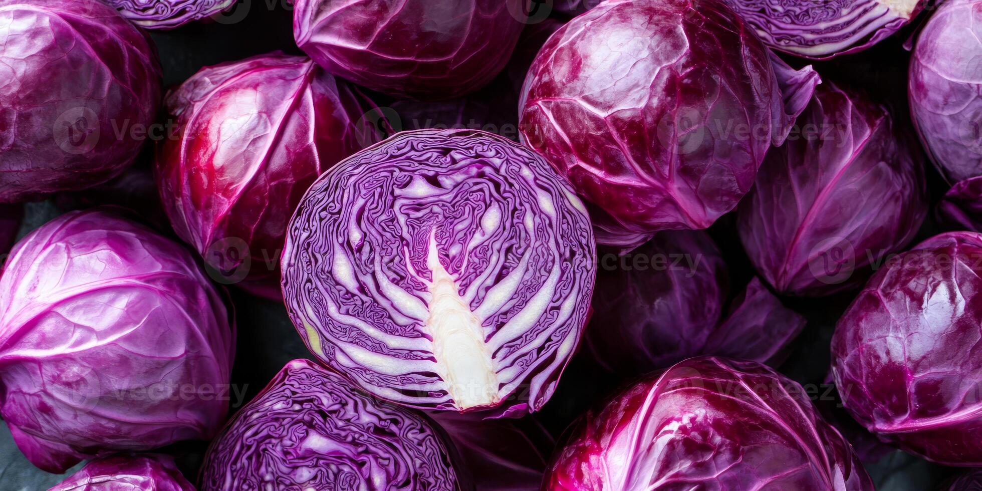 Vibrant and fresh red cabbage heads provide the perfect addition for delicious salads and nutritious meals photo