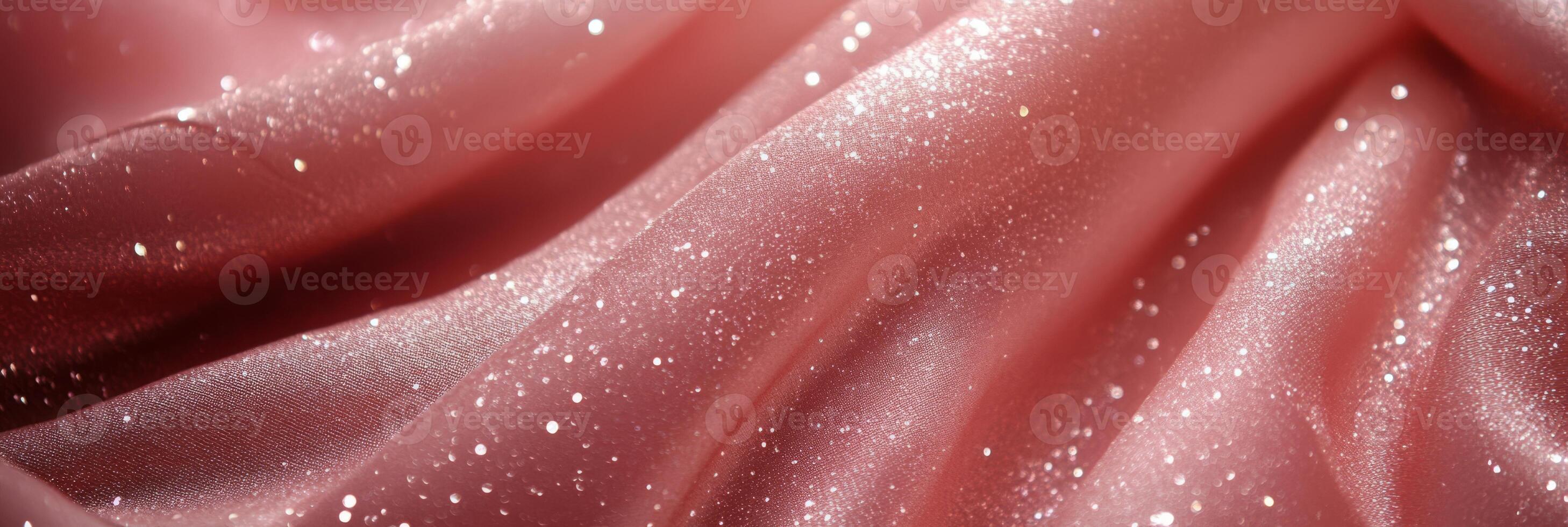 A beautiful close-up of pink satin fabric adorned with sparkling accents, perfect for fashion and design. photo