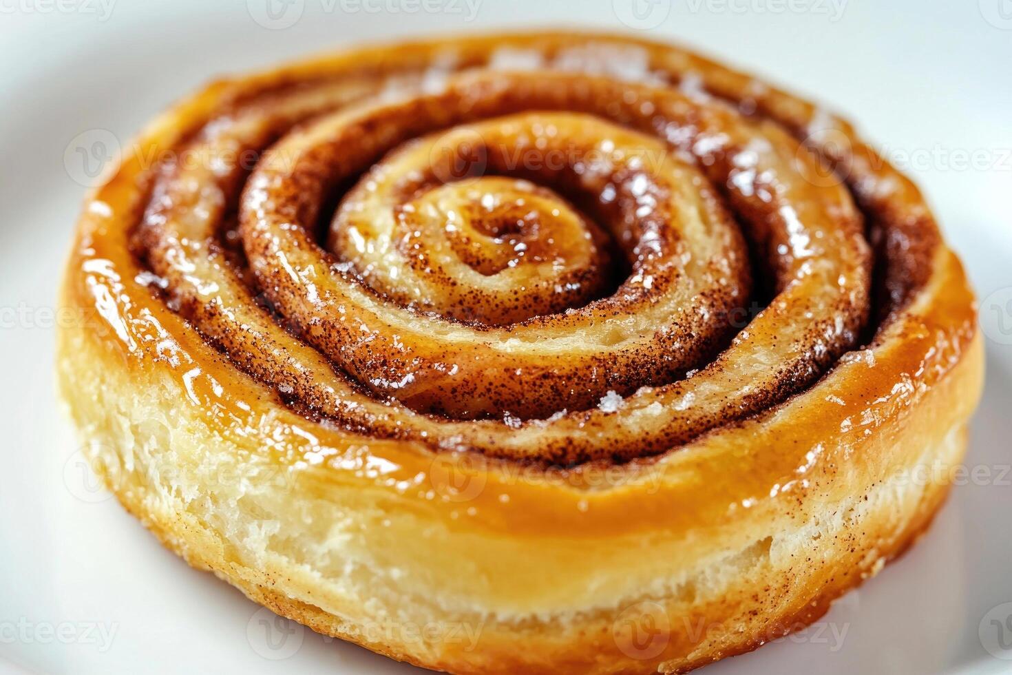 A single slice of a cinnamon roll. photo