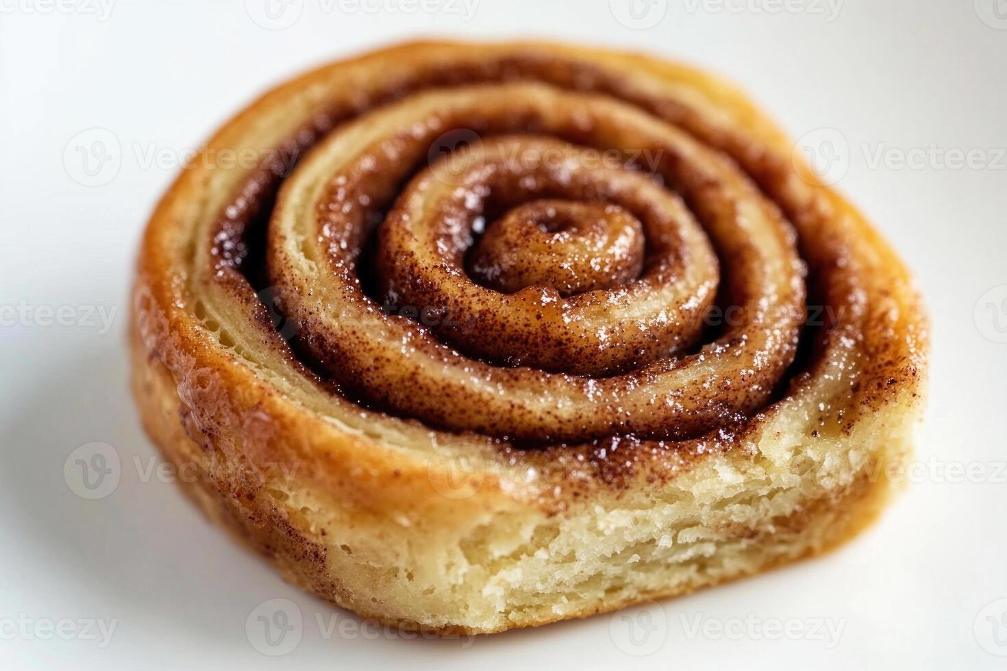 A single slice of a cinnamon roll. photo