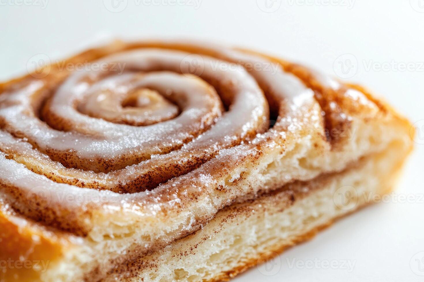 A single slice of a cinnamon roll. photo