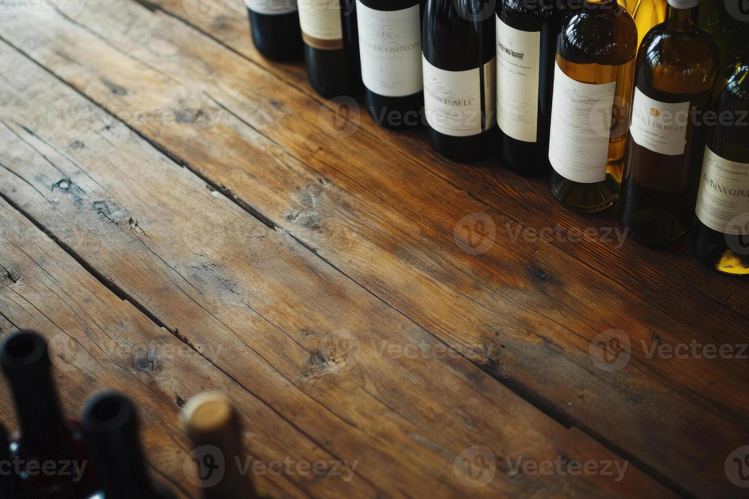 Wine bottles on a wooden table with a blank space. photo