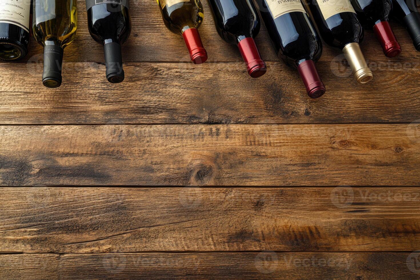 Wine bottles on a wooden table with a blank space. photo