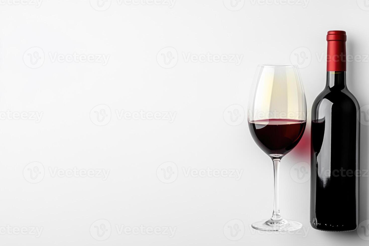 Wine glasses and an open bottle on a white background. photo