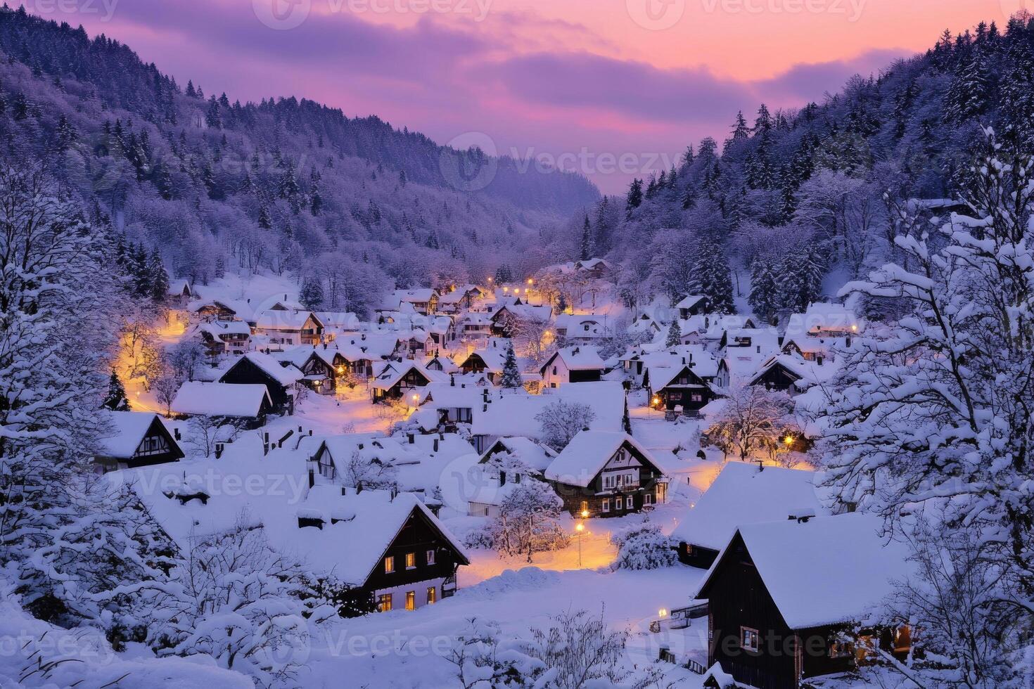 A quaint village blanketed in snow as the sun sets. photo