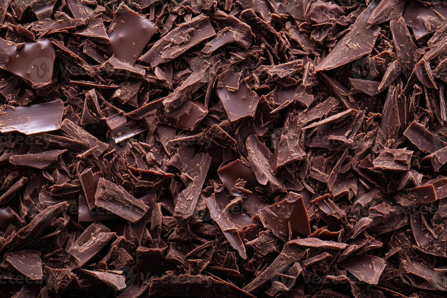 A textured layer of shredded chocolate forms a rich, indulgent background. photo