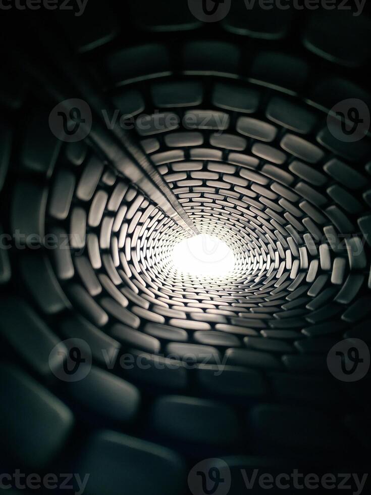 Tunnel architecture with light at the end. photo