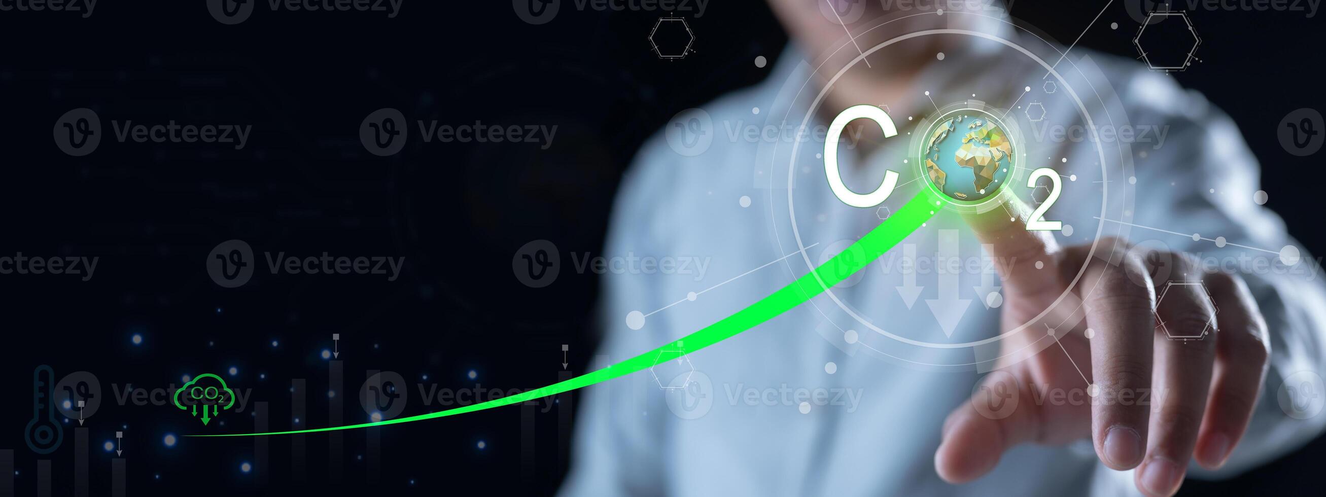 Human hand point to increasing arrow with carbon reduction.Bio Circular Green Economy concept.CO2 reducing icon in concept of decrease carbon dioxide emission. photo