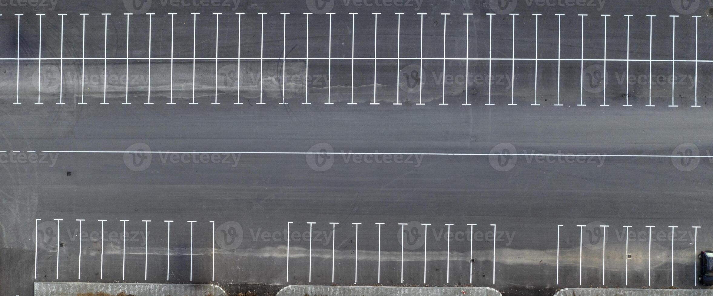 Aerial top view of empty parking lots. Drone photography. photo