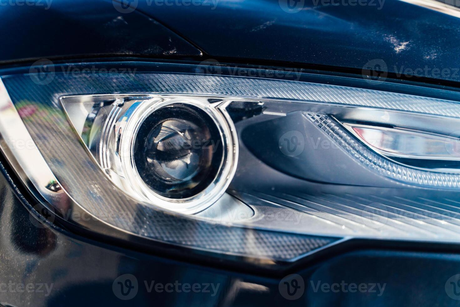 Closeup headlights of car photo