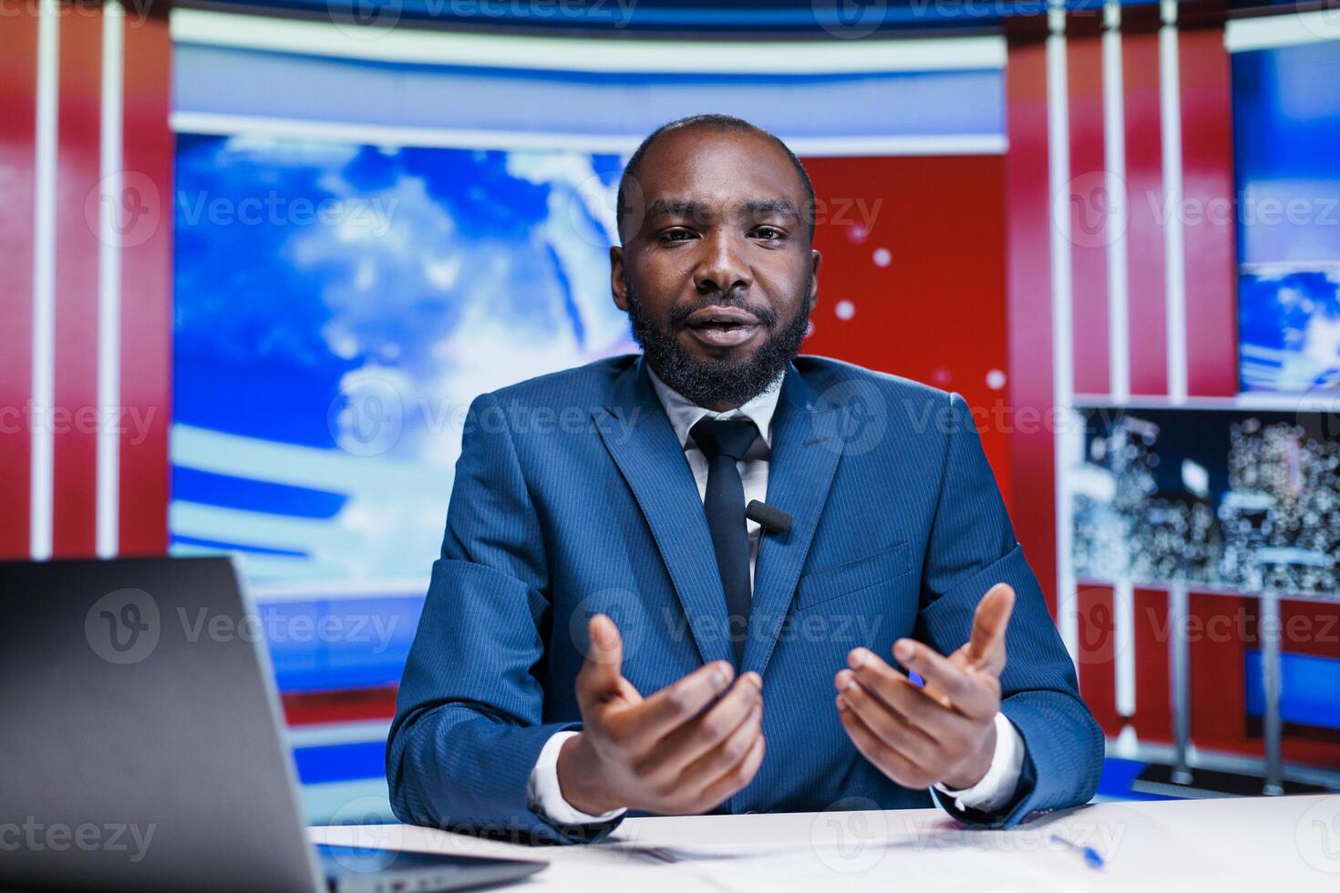 News anchor presenting daily events on global television program, covering all latest topics regarding public life and celebrities. African american reporter transmitting live information. photo