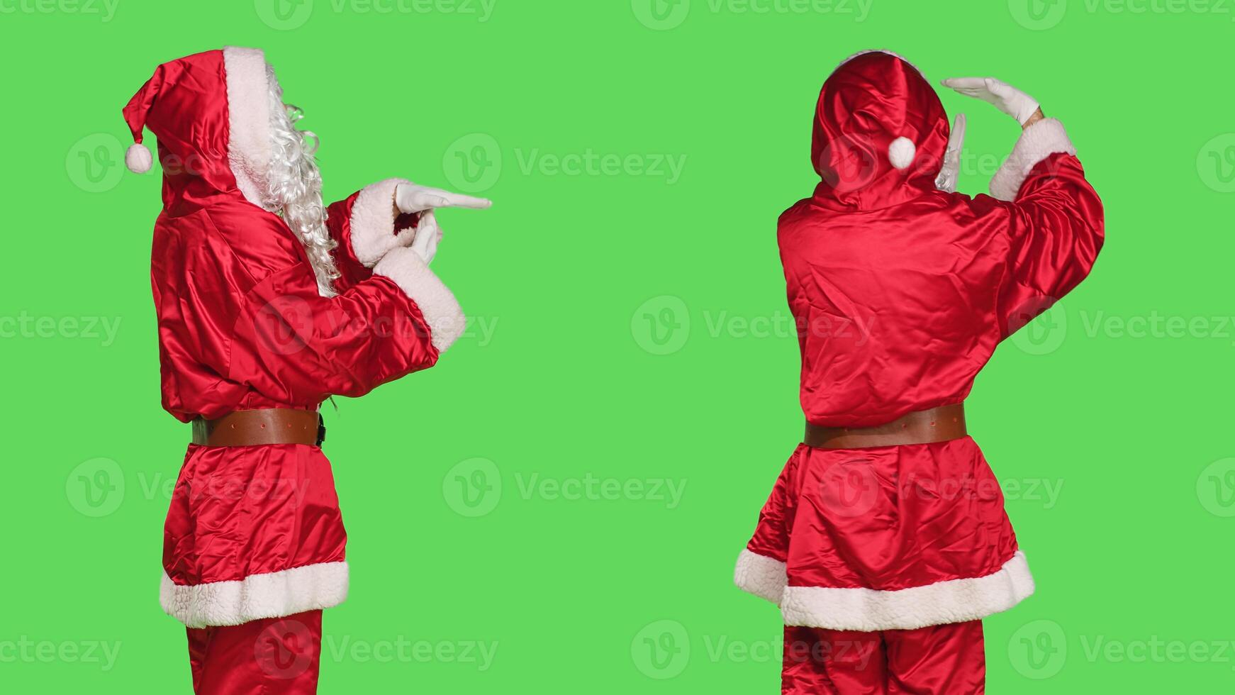 Father christmas character does timeout sign, posing in festive winter costume over greenscreen background. Young adult in santa claus red suit showing pause symbol, asking for a break. photo