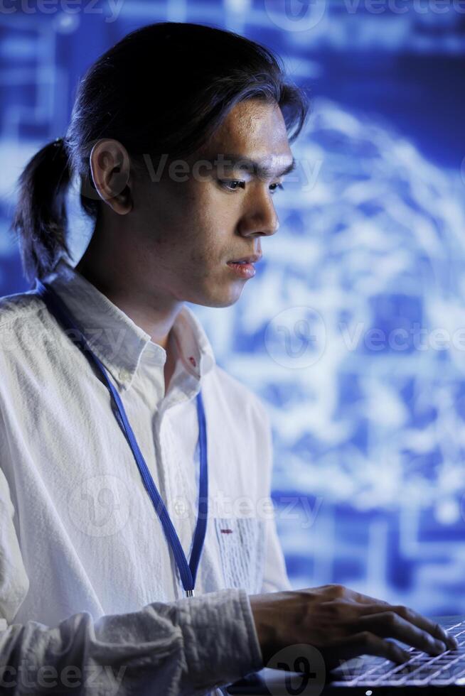 Certified engineer using laptop to maintenance artificial intelligence neural networks simulating human thought processes in computerized model. Skilled employee doing checkup on AI systems photo