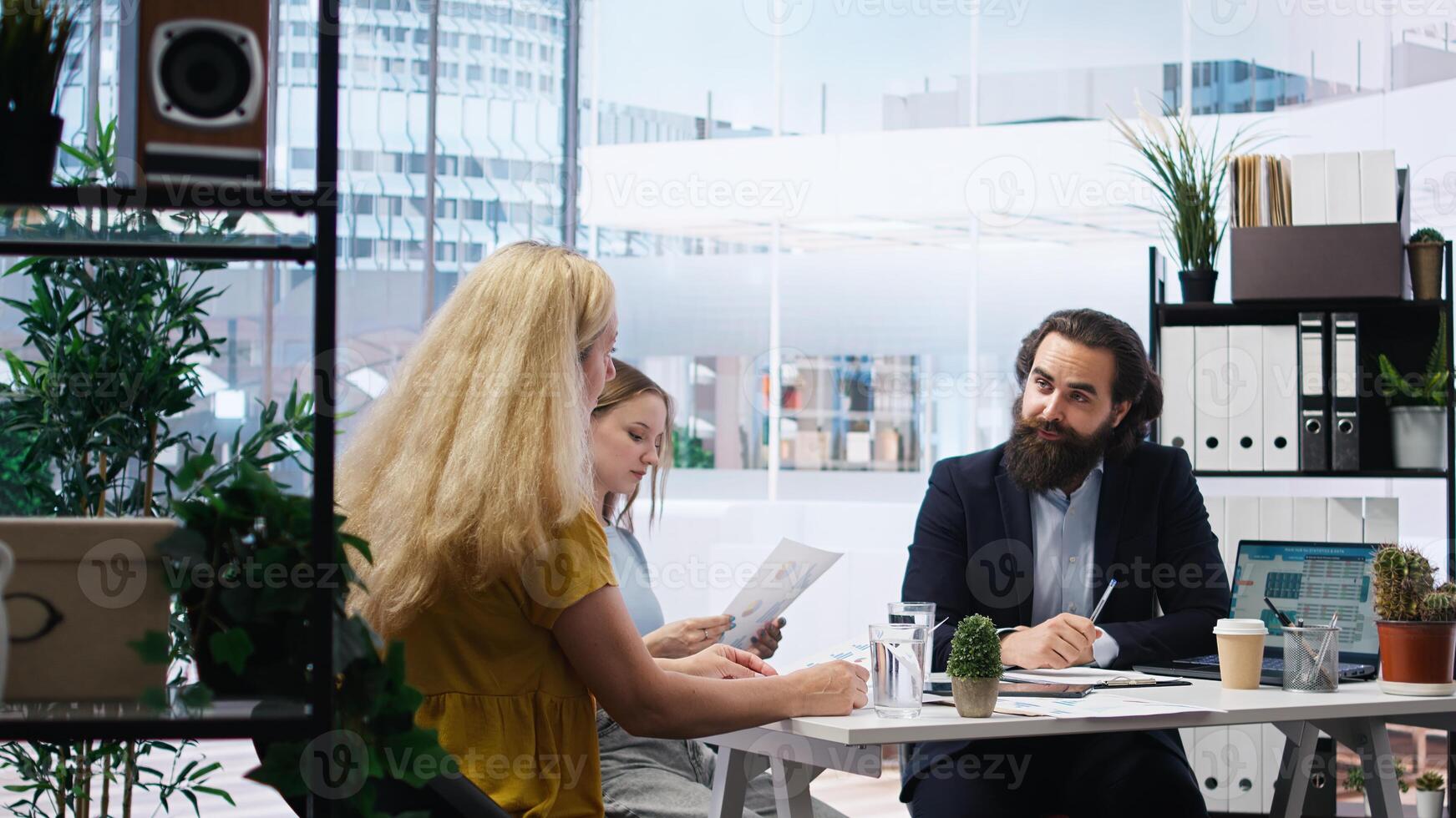 Financial advisor assessing clients economic needs and goals to provide personalized planning advice. Agent optimizing investment returns for family requesting help while managing risk, camera A photo