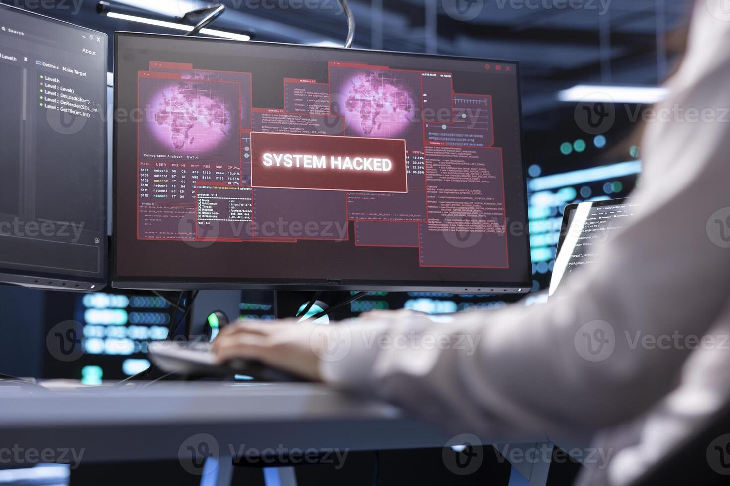 IT professional in server hub trying to protect hardware from hacker stealing information. Worker in high tech data center workplace trying to fix security breach alert caused by virus photo