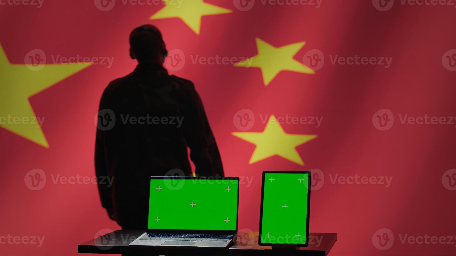 Chinese air defense division personnel monitors incoming enemy aerial attacks with green screen devices. China secret service maintains air space superiority with chroma key radar equipment, camera A photo