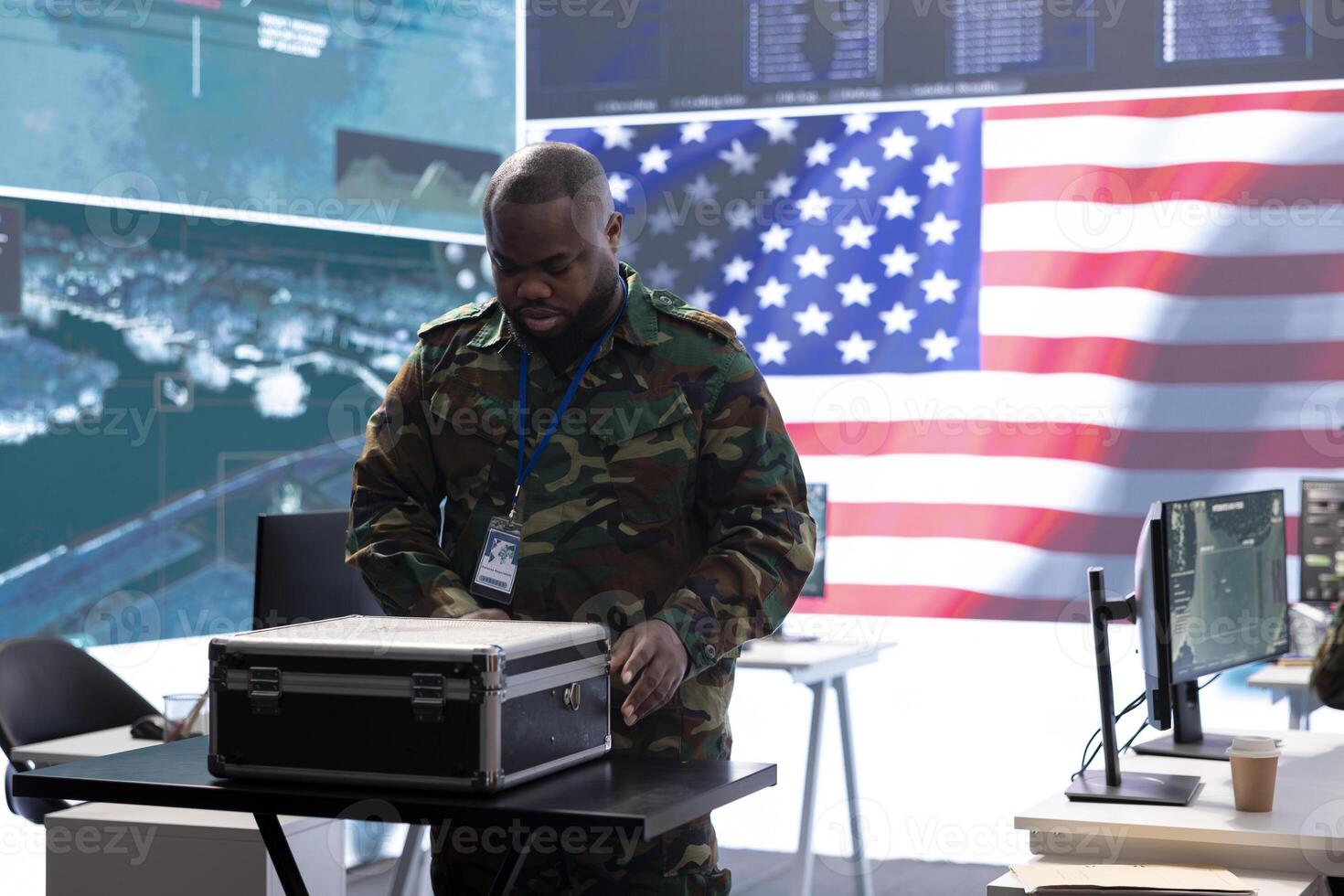 Military specialists in a control center monitor global security operations, manage surveillance systems and protect classified data using advanced technology to ensure national defense. photo