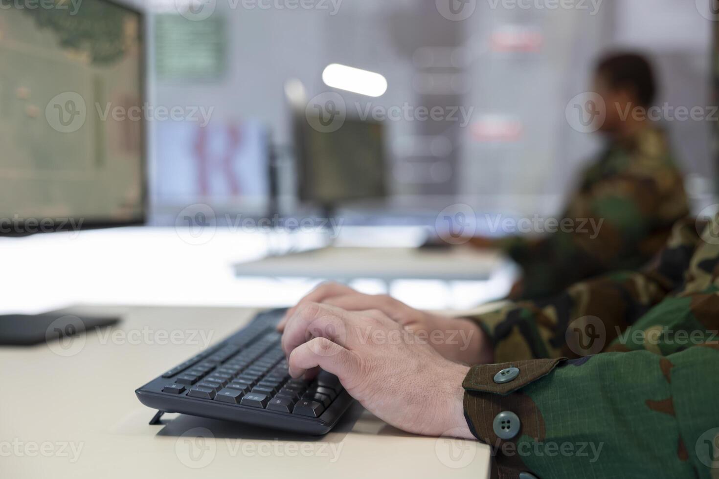 IT division commander handling surveillance and safety operations with CCTV radar system, gps tracking on satellite station world map to oversee field missions within enemy territory. Close up. photo