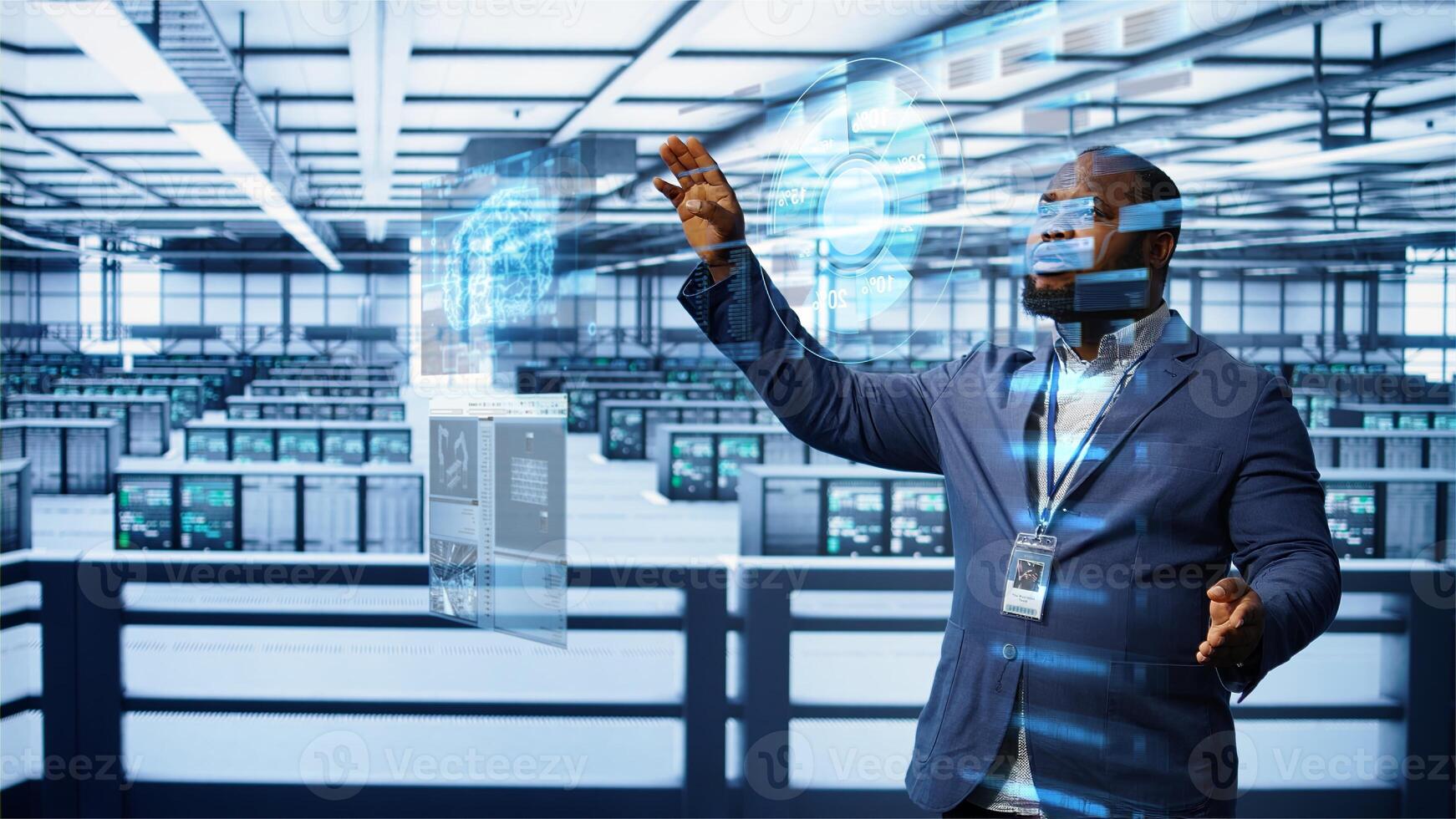 Engineer using augmented reality tech in data center, installing software, troubleshooting issues. African american expert in server hub looks at AR hologram, establishing performance benchmarks photo