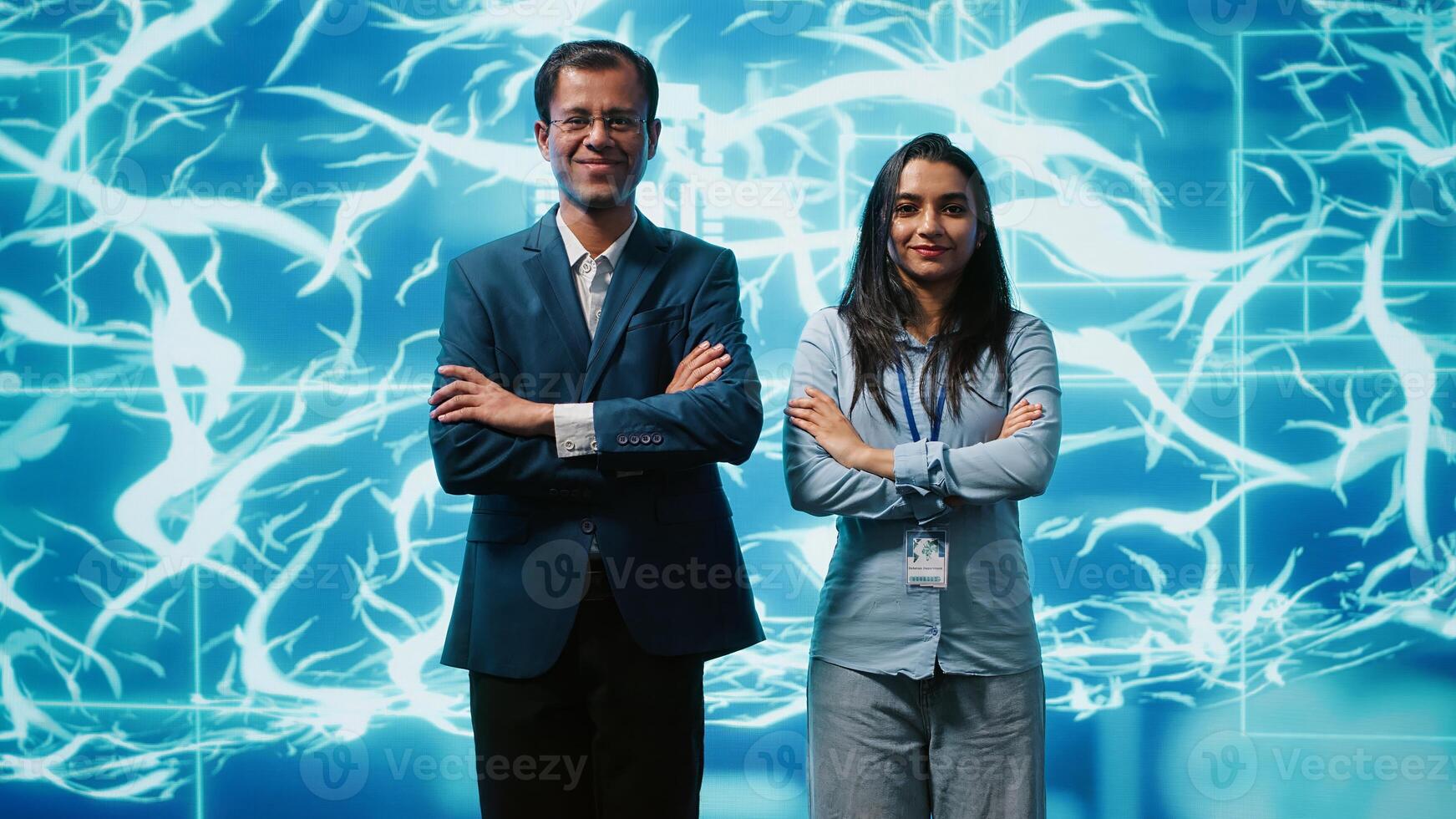 Portrait of cheerful team of admins using artificial intelligence computing simulating human brain. Smiling colleagues working with AI machine learning algorithms, camera A photo