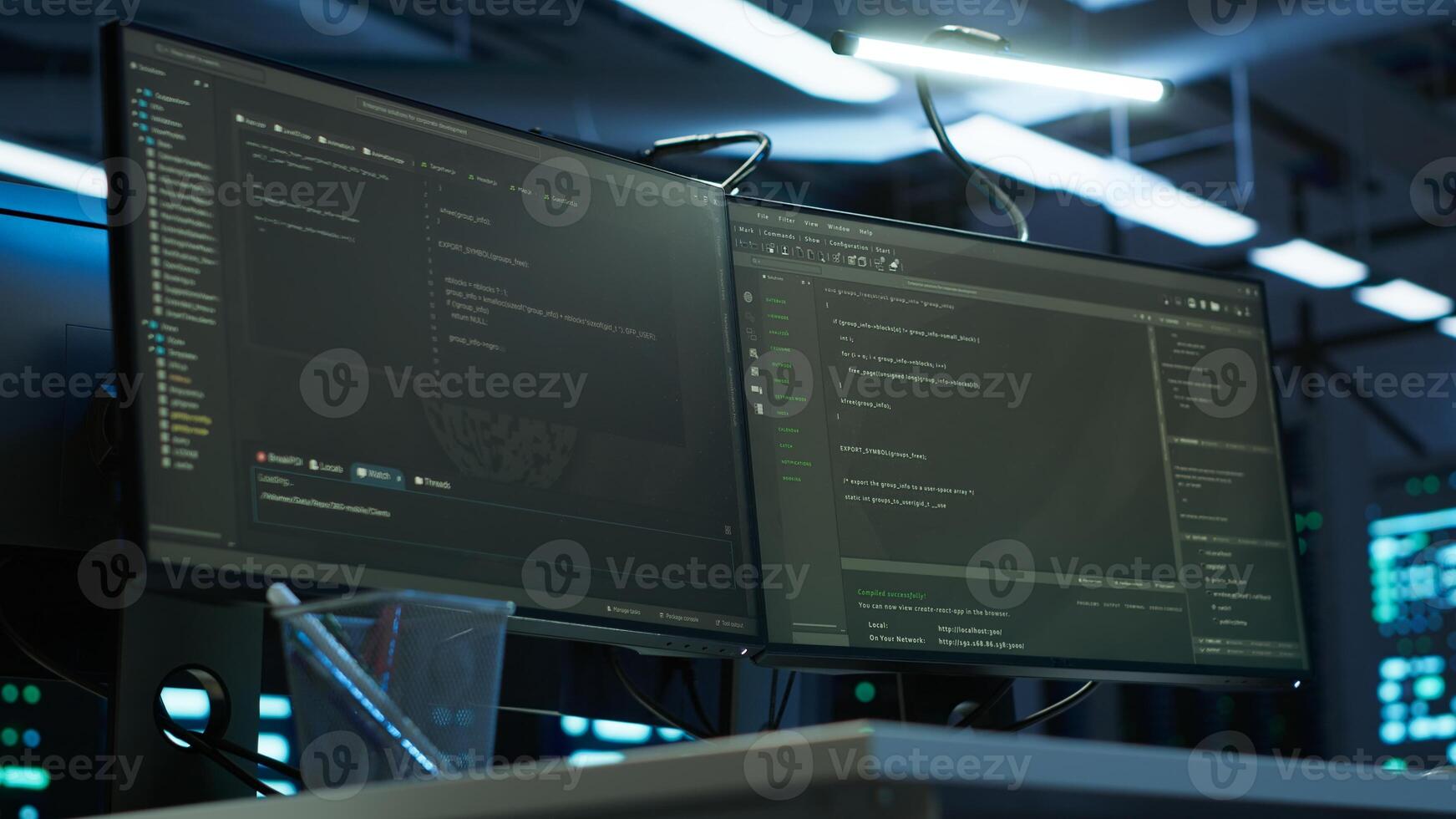 Computers in data center facility used for managing hardware mainframe energy consumption. Close up on PC displays in high tech establishment used for automation and monitoring processes in server hub photo