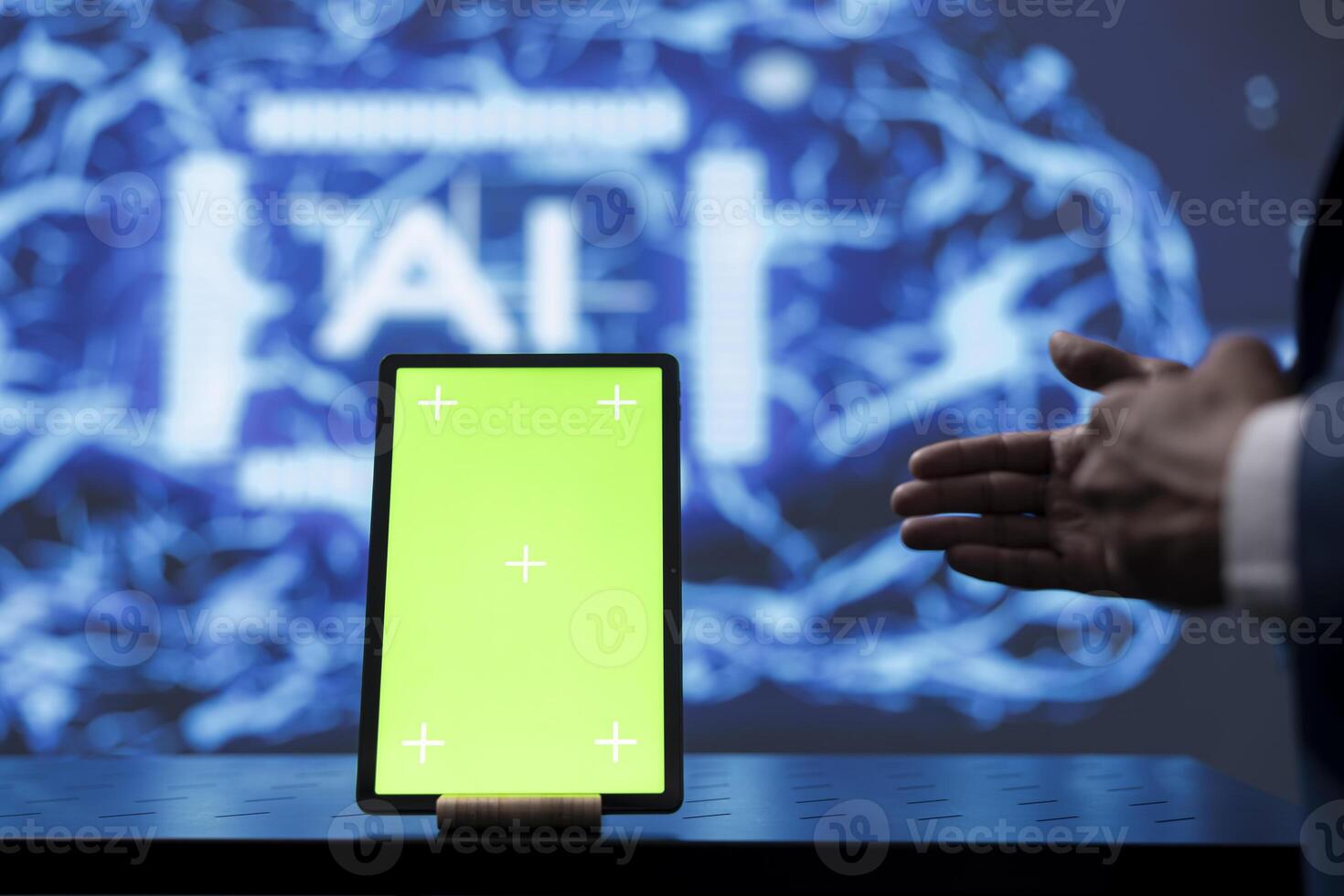 Engineer in startup doing advancements in AI field using mockup tablet. Close up of isolated screen device used by man working in cutting edge workspace featuring artificial intelligence photo