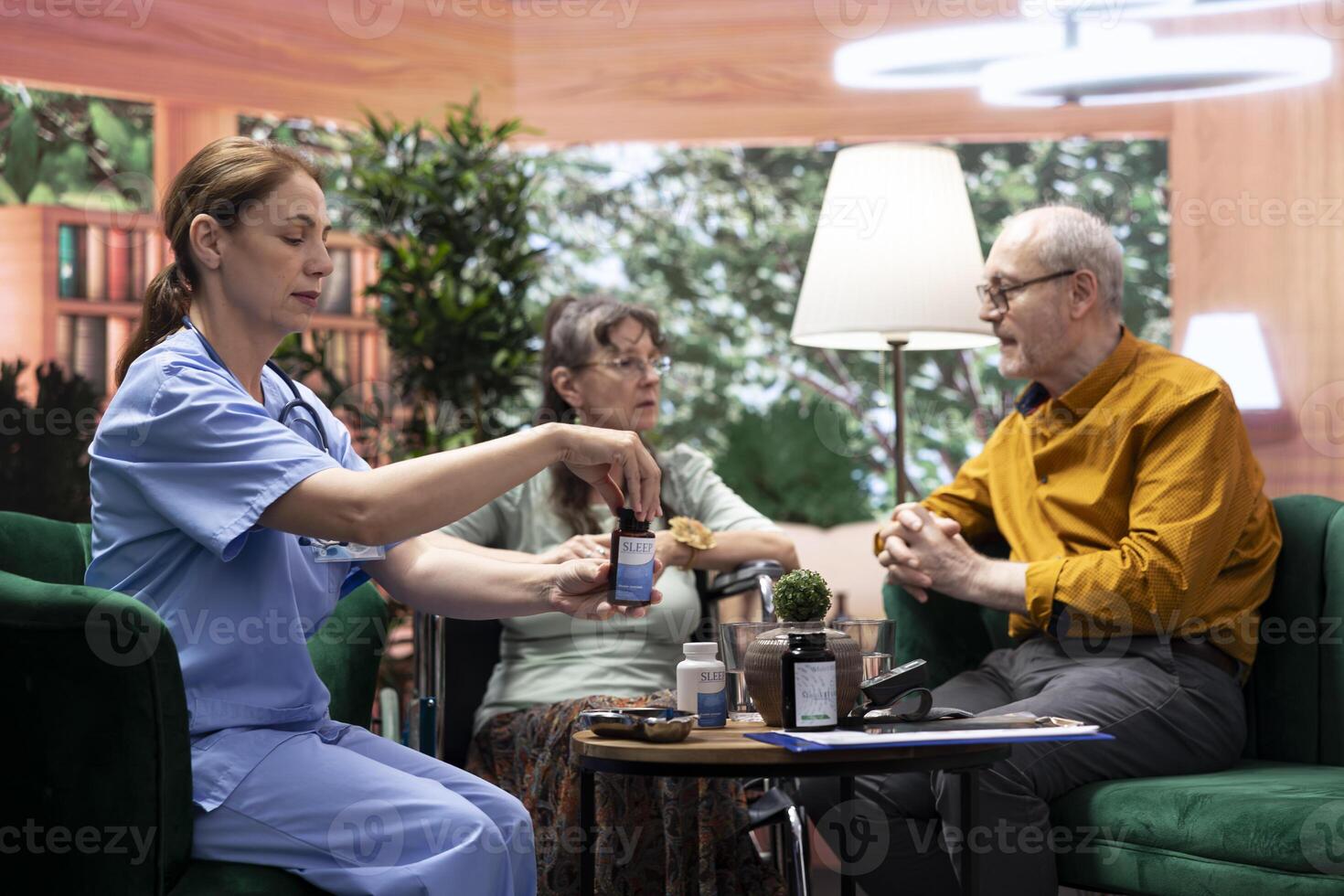 Social caretaker providing pills and medicine in different bottles for two patients, preparing the weekly treatment with daily doses for elderly man and woman. Nurse offer health aid. Close up. photo