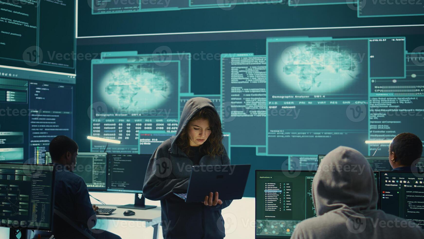 Hackers group failing to hack a system in high tech agency office, reading critical error message on big screen. Specialists trying to steal important database information from rival states. Camera B. photo
