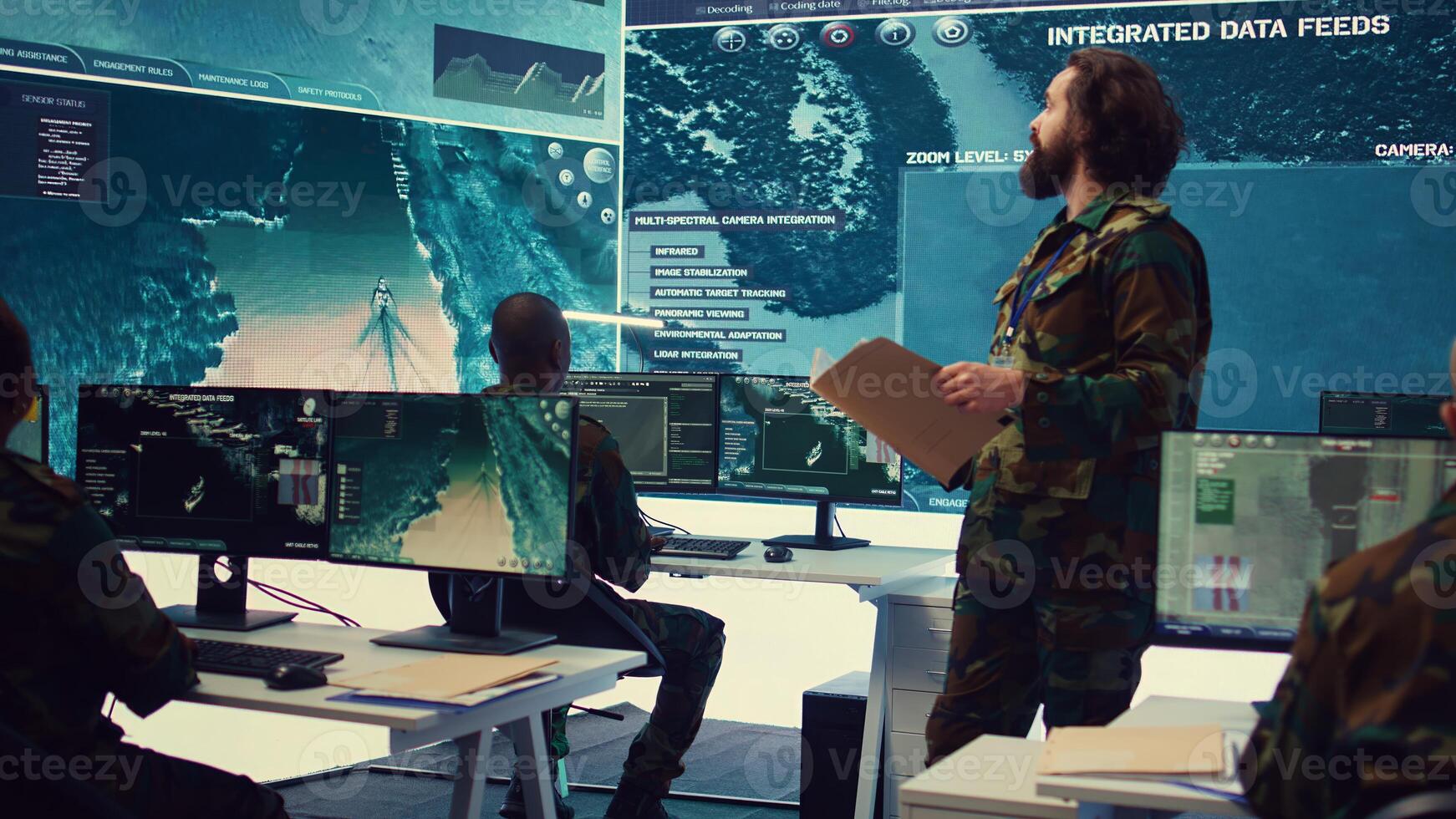 Army major reads operation details from a case file in a control center military headquarters, manages personnel and resources for logistical or operational missions. Task force command. Camera B. photo