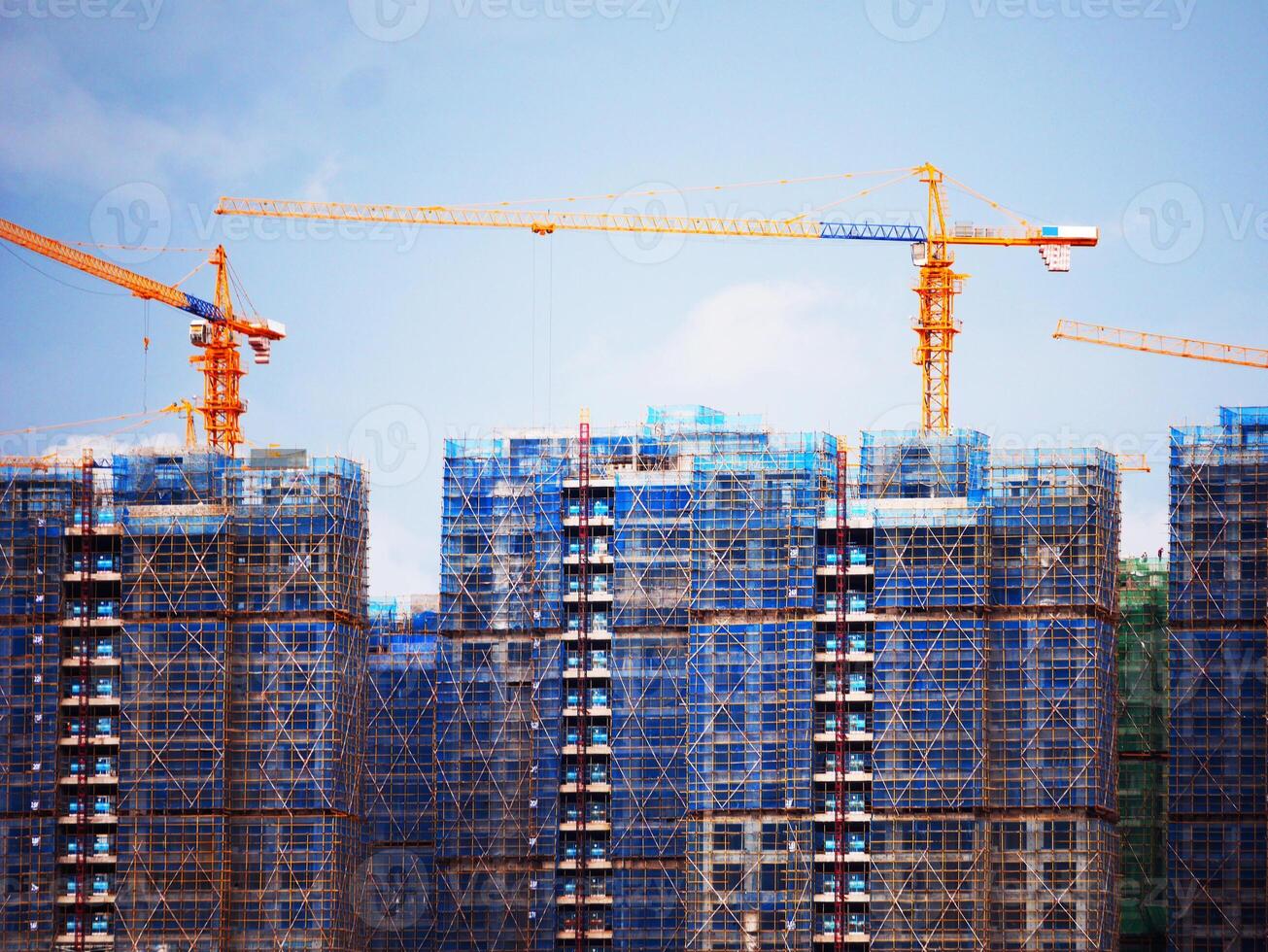 construction site with crane, Tower Crane Operating At Development Site, City, crane and construction with apartment buildings, property development, infrastructure, Urban landscape, civil engineering photo