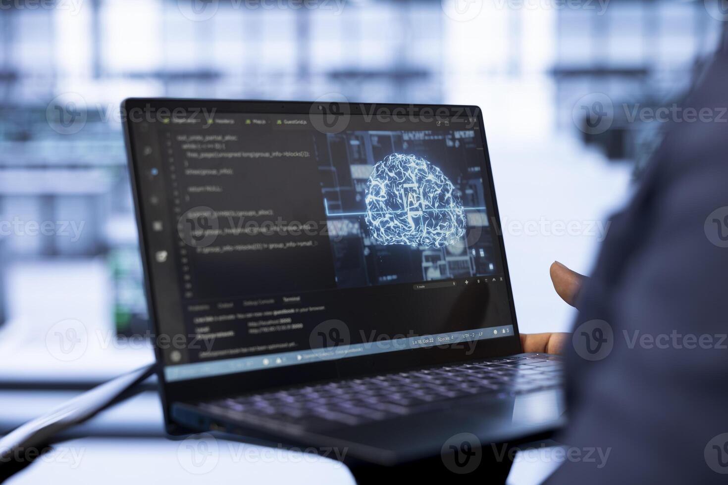 System administrator using laptop in data center, updating AI systems. Close up of device used by server room software developer upgrading artificial intelligence simulation model photo