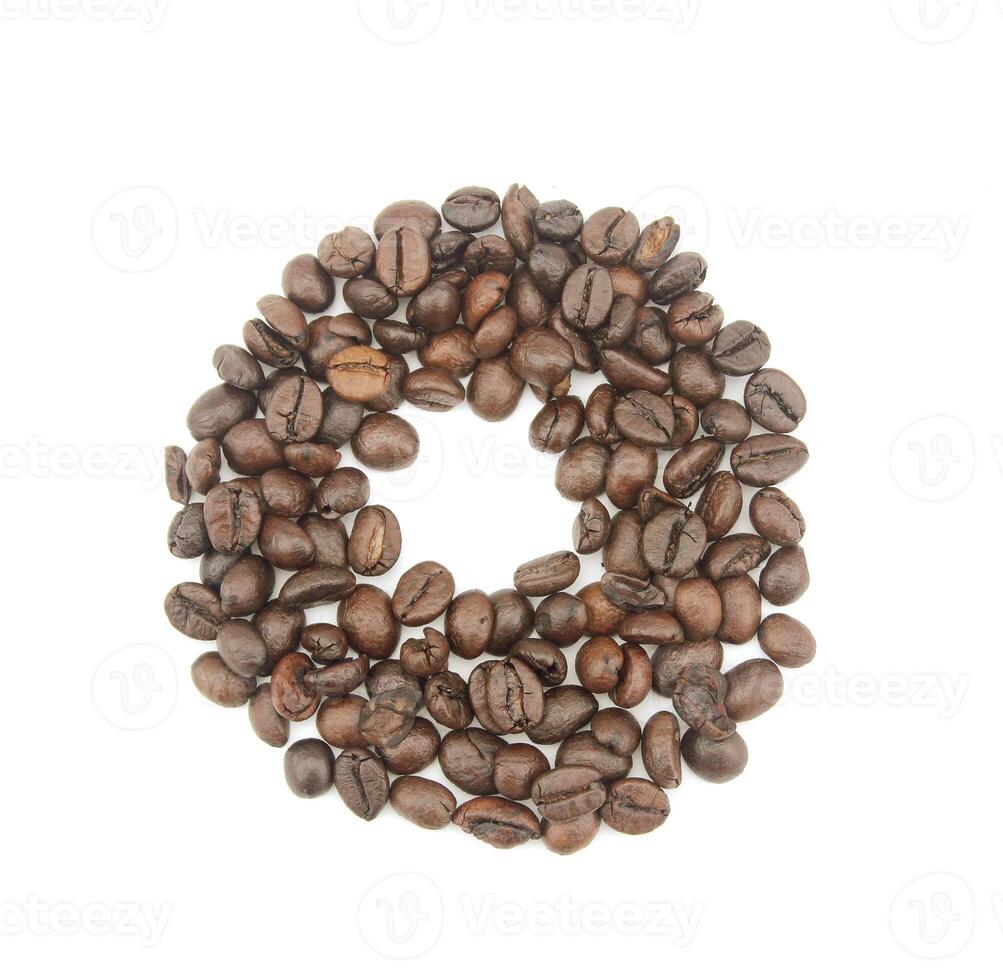 0 number made with coffee beans on a white background photo