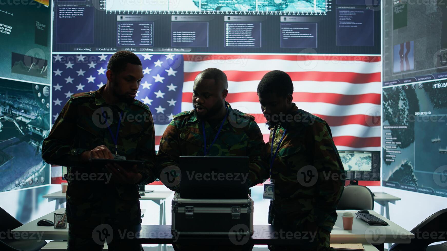 Military officer in a high tech control center engages in cybersecurity operations, protecting classified data from threats and managing digital warfare strategies to maintain state secrets. Camera B. photo