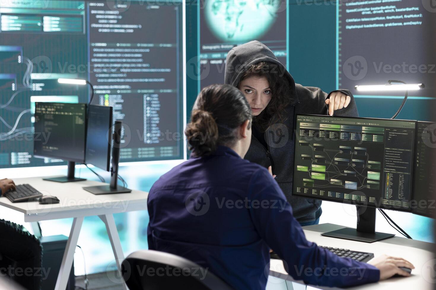Governmental hackers doing teamwork in protecting sensitive information from cyber threats of digital mercenaries. Experts focusing on online security and cyber defense tactics. photo