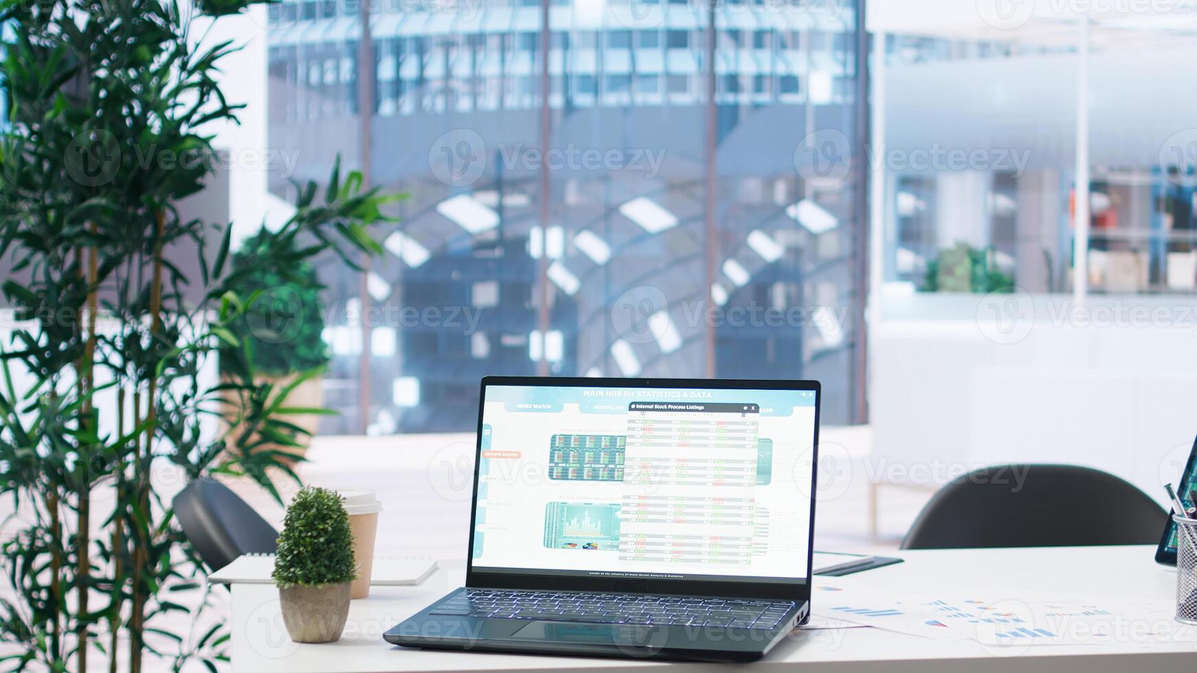 Laptop screen in office showing stock exchange indices changing in real time. Notebook in workspace with forex trading indexes displayed live showing latest price modifications photo
