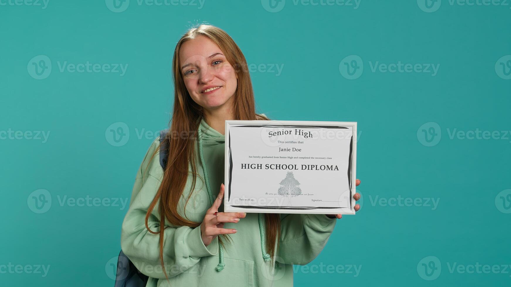 Portrait of smiling student holding high school diploma, celebrating passing classes with high marks, attending graduation ceremony. Happy young girl delighted about receiving certification, camera A photo