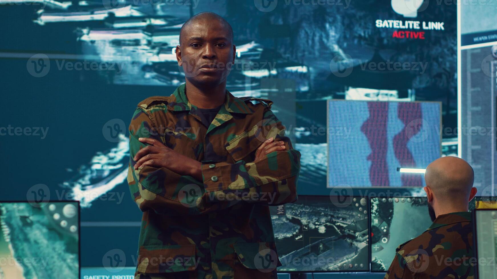 Portrait of national guard commander dressed in military camouflage uniform, team leader overseeing operations in control center. Army officer works on missions at federal agency base. Camera A. photo