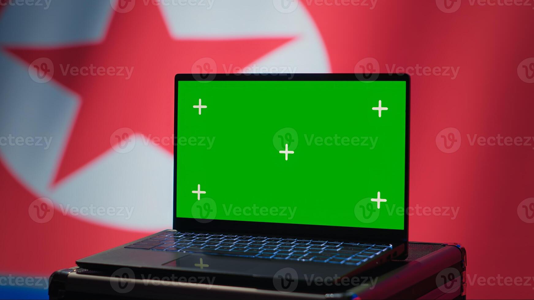 North Korea soldier using radar on green screen laptop to detect missiles during korean conflict. Pyongyang regime army soldier scanning rockets with chroma key notebook, close up shot, camera A photo
