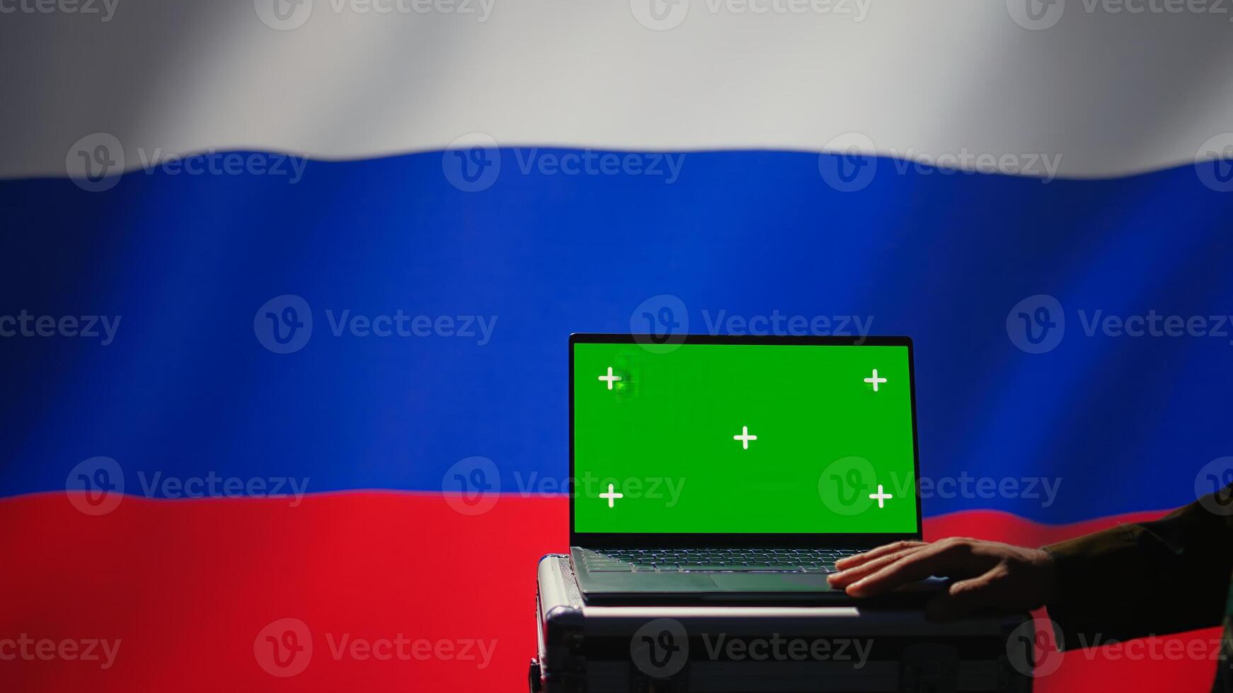Russian soldier using military tech on green screen laptop to identify threats from enemies. Russia ex KGB FSB personnel using software on mockup notebook to relay info to war front lines, camera B photo