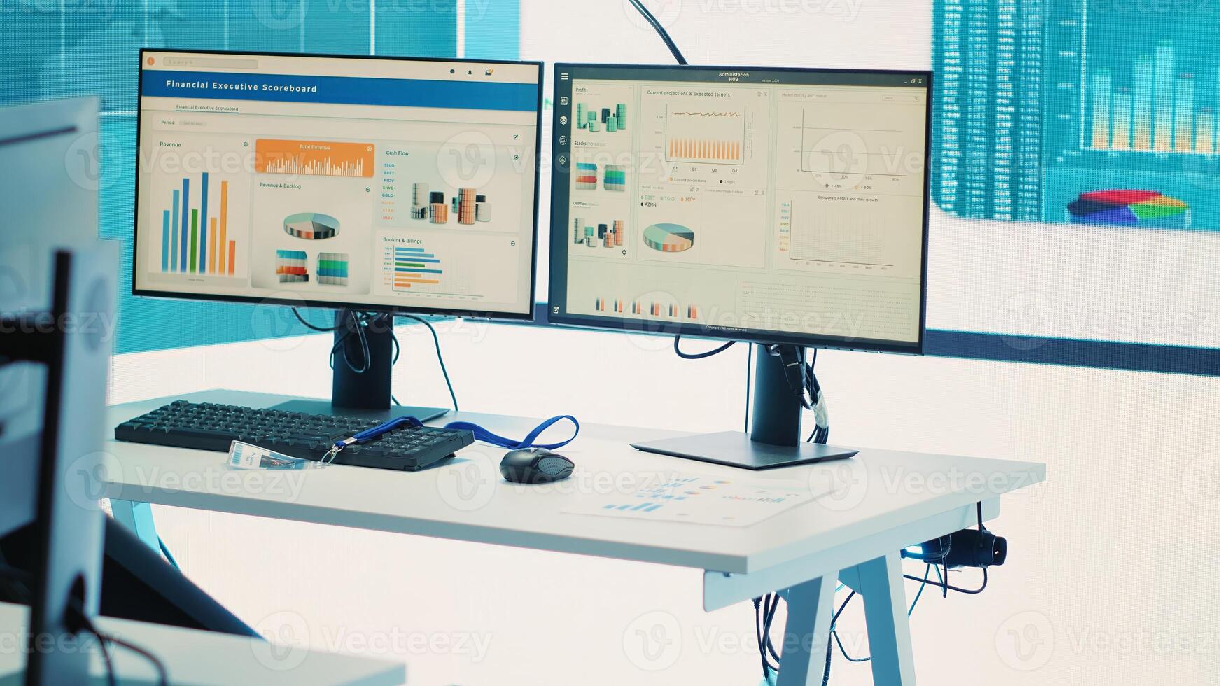 Empty telecommunications company control and monitoring room, coworking space equipped with multiple workstations and a big screen to follow organizational progress and growth. Camera A. photo