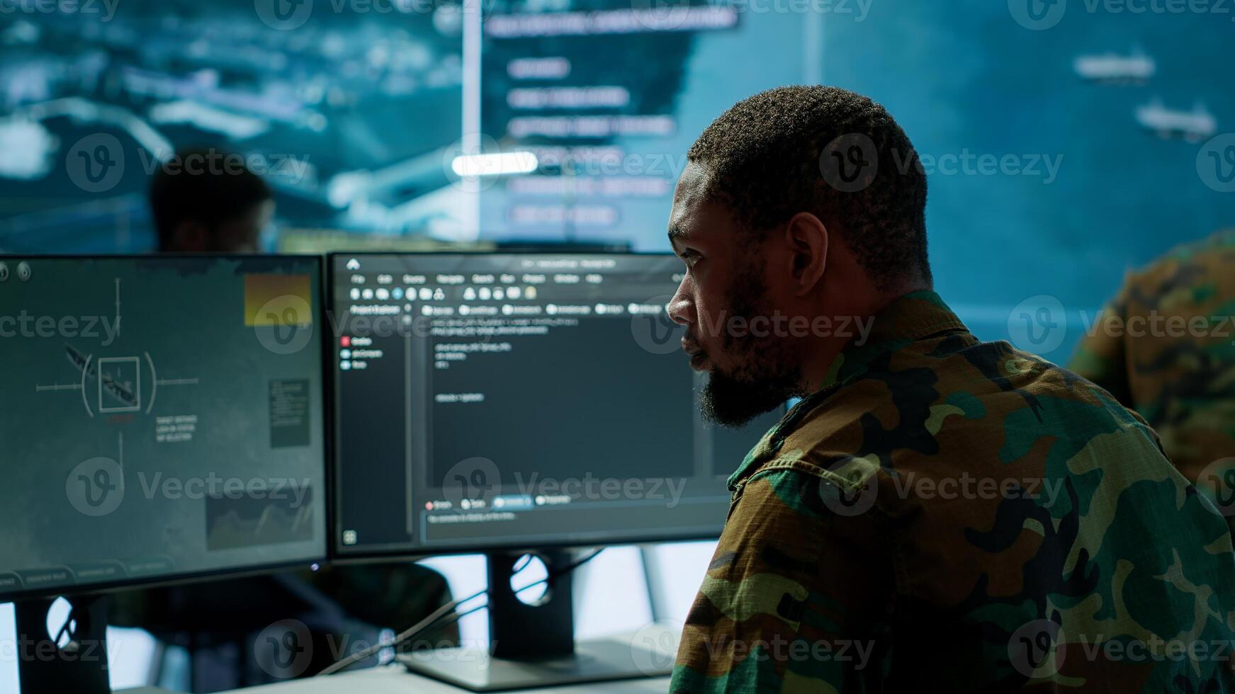 Soldier working with AI intelligence on pc in control room, processing live data on cctv systems. Surveillance efforts to support field missions and defense operations, national security. Camera A. photo