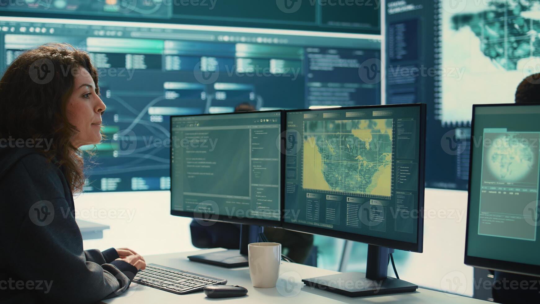 Cyber operations center with governmental hackers working on digital security activities during hybrid war. Specialists team ensuring security and malware detection, cyber surveillance. Camera B. photo